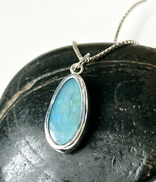 Mintabie Opal Sterling Silver Pendant Necklace featuring a blue opal on a silver chain