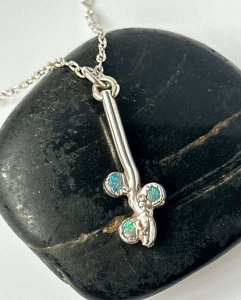 Lightning Ridge 3 Opal Sterling Silver Pendant Necklace showcasing three solid opals on a sterling silver chain.